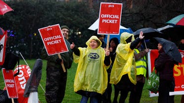 Members of the Public and Commercial Services (PCS) Union take part in a border force workers strike action near Heathrow Airport, in London, Britain December 23, 2022. (Reuters)