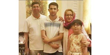 Farzaneh-and-Hamid-Ghareh-Hassanlou-and-their-children-min