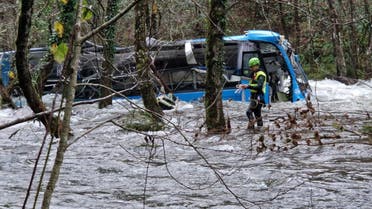 A bus submerged in a river in the Galicia region of Spain, shared by the Galician emergency services on Twitter. (Twitter)