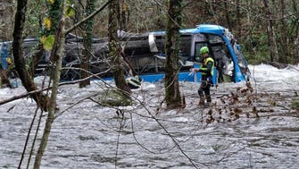 At least 3 dead, 4 missing in Spain after bus plunges off bridge into river