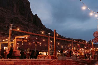 People sit in the AlUla Old Town. (Supplied)