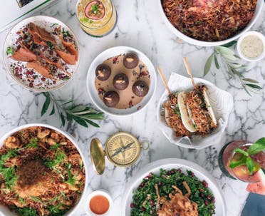 A display of different dishes is set on a table in the restaurant Somewhere in AlUla. (Photo courtesy of Somewhere)