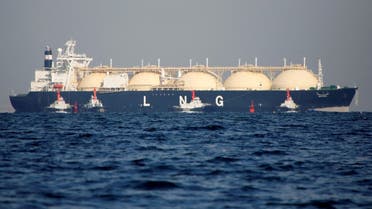 A liquefied natural gas (LNG) tanker is tugged towards a thermal power station in Futtsu, east of Tokyo. (File photo: Reuters)