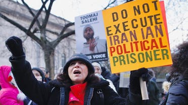 People protest against executions and detentions in Iran, in front of the Iranian Permanent Mission to the UN in New York City on December 17, 2022. (AFP)