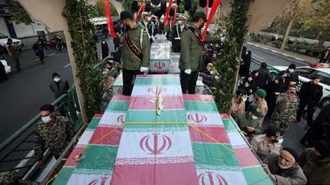 Mourners attend a funeral procession carrying the remains of 200 Iranian soldiers recovered from former battlefields of the Iran-Iraq war (1980-1988), in Tehran on December 27, 2022. (AFP)