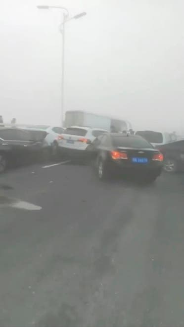 Cars pile up and crash into a bridge in Zhengzhou, China's Henan province, in this screengrab taken from a social media video released on December 28, 2022.  (Reuters)