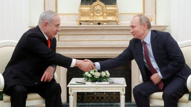 Russian President Vladimir Putin shakes hands with Israeli Prime Minister Benjamin Netanyahu as they meet in Moscow, Russia January 30, 2020. (Reuters)