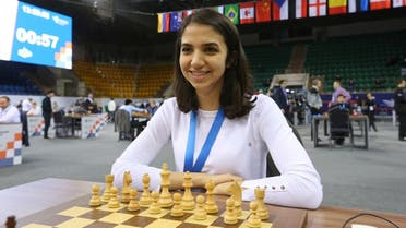 Sara Khadem of Iran sits in front of a chess board at the FIDE World Rapid and Blitz Chess Championships in Almaty, Kazakhstan on December 30, 2022. (Reuters)