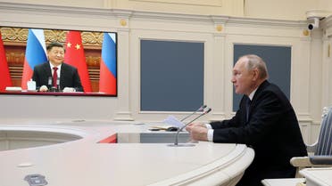 اجتماع عبر الفيديو بين الرئيسين الروسي والصيني (رويترز)