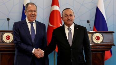 Russian Foreign Minister Sergei Lavrov and Turkish Foreign Minister Mevlut Cavusoglu shake hands as they attend a news conference during a meeting in Ankara, Turkey on June 8, 2022. (Reuters)
