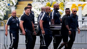 Pallbearers carry the casket of Brazilian soccer legend Pele to the centre circle of his former club Santos’ Vila Belmiro stadium on January 2, 2023, where he will lie in state for 24 hours before his funeral. (Reuters)
