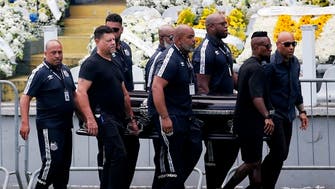 Fans line up to mourn Brazilian soccer great Pele  ahead of his funeral