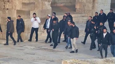 The Israeli minister in the courtyard of Al-Aqsa Mosque