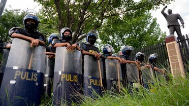 Police officers gather in front of the Commission on Human Rights where activists are expected to hold a protest denouncing the proclamation of the new Philippine president and vice president, in Quezon City, Metro Manila, Philippines, May 25, 2022. (File photo: Reuters)