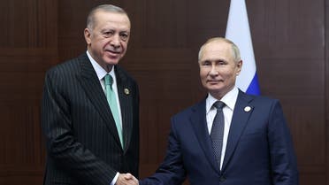 Turkish President Recep Tayyip Erdogan (L) meets Russian President Vladimir Putin on the sidelines of the Conference on Interaction and Confidence Building Measures in Asia (CICA) in Astana, on October 13, 2022. (Turkish presidential press service via AFP)