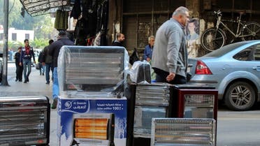 A man walks past heaters for sale in Damascus, Syria December 6, 2022. REUTERS/Firas Makdesi