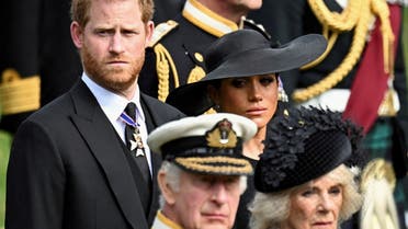 Britain’s Meghan, Duchess of Sussex, cries as she, Prince Harry, Duke of Sussex, Queen Camilla and King Charles attend the state funeral and burial of Britain’s Queen Elizabeth, in London, Britain, September 19, 2022. (Reuters)