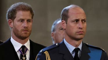 FILE PHOTO: Britain's William, Prince of Wales, and Prince Harry react as the coffin of Britain's Queen Elizabeth arrives at Westminster Hall from Buckingham Palace for her lying in state, in London, Britain, September 14, 2022. REUTERS/Alkis Konstantinidis/Pool/File Photo