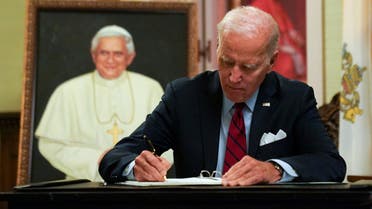 U.S. President Joe Biden signs a book of condolences for former Pope Benedict at the Apostolic Nunciature of the Holy See, in Washington, U.S., January 5, 2023. (Reuters)