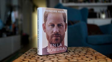 A copy of the “En la sombra” (In the shadow), Spanish version of the book “Spare” an autobiography by Britain’s Prince Harry, is pictured at a reader’s home in Madrid on January 5, 2023, despite the publication date set at January 10 with stringent measures in place. (AFP)