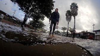 Torrential rain, winds lash California, killing at least two