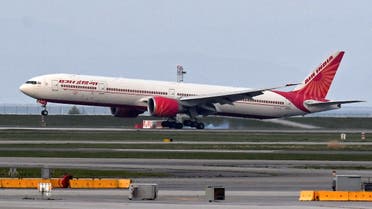 Air India flight 185 arrives from New Delhi, narrowly beating the cut-off after Canada's government temporarily barred passenger flights from India and Pakistan for 30 days, at Vancouver International Airport in Richmond, British Columbia, Canada April 23, 2021. (Reuters)