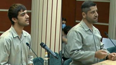 An image grab of footage obtained from Iranian State TV IRINN on January 7, 2023 shows Mohammad Mahdi Karami and Seyyed Mohammad Hosseini attending a court hearing in Karaj on December 5. (IRINN via AFP)