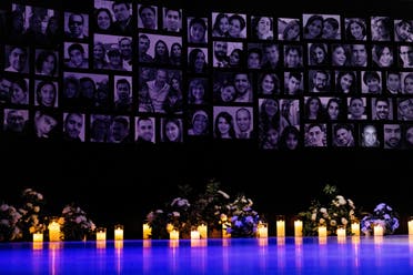 The stage with photos of the victims at an event marking the third anniversary of the downing of Ukraine International Airlines flight PS752, which was shot down near Tehran by Iran's Revolutionary Guards, in Toronto, Ontario, Canada January 8, 2023. (Reuters)