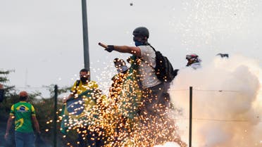 Supporters of Brazil's former President Jair Bolsonaro demonstrate against President Luiz Inacio Lula da Silva, outside Brazil’s National Congress in Brasilia, Brazil, January 8, 2023. (Reuters)