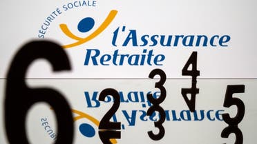 This picture, taken on January 8, 2023 in Toulouse, southwestern France, shows a screen displaying the logo of the retirement insurance and numbers in relation to the pension reform carried out by French government, whose banner policy is to raise the retirement age from the current level of 62. (AFP)