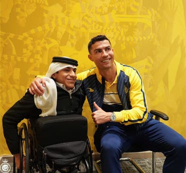 Cristiano Ronaldo with Qatari fan Ghanem Al-Muftah 