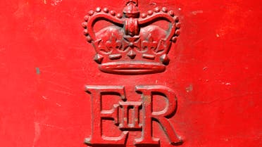 Part of the royal crest is seen on a Royal Mail post box in central London June 14, 2011. The Royal Mail reported that it's annual profits were lower, which was in part due to lower volumes of mail, local media reported. (Reuters)