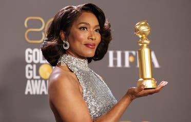 Angela Bassett poses with her award for Best Supporting Actress - Motion Picture in Black Panther: Wakanda Forever at the 80th Annual Golden Globe Awards in Beverly Hills, California, U.S., January 10, 2023. (Reuters)