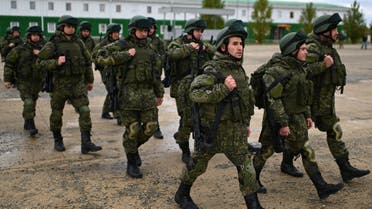 Russian reservists recruited during the partial mobilisation of troops attend a ceremony before departing to the zone of Russia-Ukraine conflict, in the Rostov region, Russia October 31, 2022. REUTERS/Sergey Pivovarov