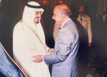 Hussein el-Husseini shakes hands with late Saudi King Fahd bin Abdulaziz. (Supplied)