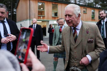 Britain's King Charles visits the Aboyne and Mid Deeside Community Shed in Aboyne, Scotland, Britain, January 12, 2023. (Reuters)