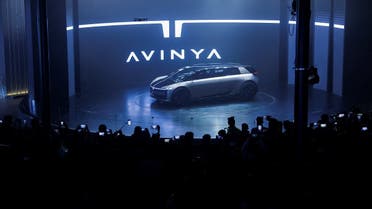 People take pictures of the Concept electric vehicle called Avinya by Tata Motors being unveiled at the Auto Expo 2023 in Greater Noida, India, on January 11, 2023. (Reuters)