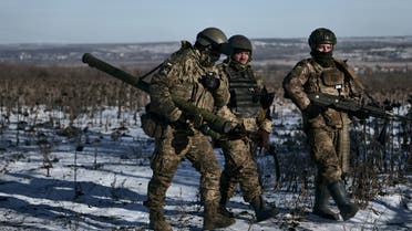 Ukrainian soldiers on their positions in the frontline near Soledar, Donetsk region, Ukraine, Wednesday, Jan. 11, 2023.(AP Photo/Libkos)