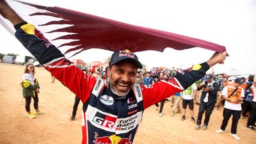 Toyota Gazoo Racing's Nasser Al-Attiyah celebrates winning the car category of the 2023 Dakar Rally. (Reuters)