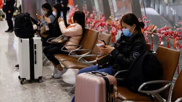 Passengers wait at West Kowloon High-Speed Train Station Terminus on the first day of the resumption of rail service to mainland China, during the coronavirus disease (COVID-19) pandemic in Hong Kong, China, January 15, 2023. REUTERS/Tyrone Siu
