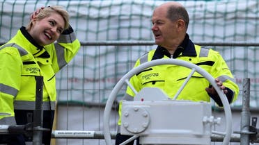 German Chancellor Olaf Scholz and Mecklenburg-Vorpommern State Premier Manuela Schwesig pose during the inauguration of the Liquefied Natural Gas (LNG) terminal ‘Deutsche Ostsee’ in the port of Lubmin, Germany, on January 14, 2023. (Reuters)