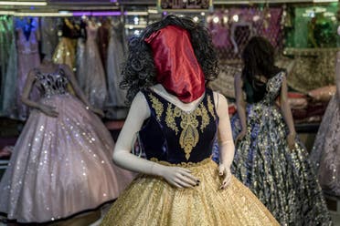 Lines of mannequins with their heads cloaked in sacks in Kabul dress stores. (Twitter)