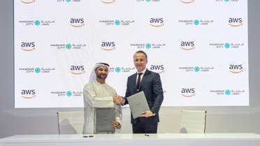 Amier Alawadhi, the acting director of Masdar City Free Zone, and Wojciech Bajda, the director of public sector Middle East and Africa at AWS, after signing the MoU in Abu Dhabi. (Supplied)