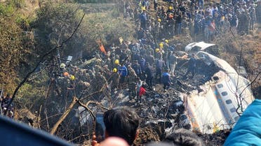 A general view of people gathered after the plane crash in Pokhara, Nepal January 15, 2023 in this picture obtained from social media. Naresh Giri/via REUTERS THIS IMAGE HAS BEEN SUPPLIED BY A THIRD PARTY. MANDATORY CREDIT. NO RESALES. NO ARCHIVES.