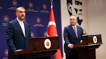 Turkey’s Foreign Minister Mevlut Cavusoglu (R) and his Iranian counterpart Hossein Amir-Abdollahian attend a joint press conference in Ankara on January 17, 2023. (AFP)