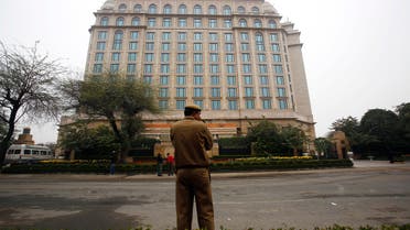 A policeman stands outside Hotel Leela Palace in New Delhi January 18, 2014. (Reuters)