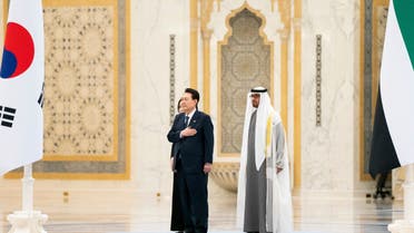 Sheikh Mohamed bin Zayed Al Nahyan, President of the United Arab Emirates, and Yoon Suk Yeol, President of South Korea, stand for the national anthem during a state visit reception at Qasr Al Watan, Abu Dhabi, United Arab Emirates, January 15, 2023. (Reuters)