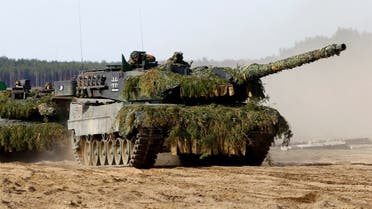 German army battle tanks Leopard 2 return after NATO enchanced Forward Presence Battle Group Lithuania exercise in Pabrade military training field, Lithuania, May 17, 2017. REUTERS/Ints Kalnins