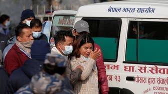 Relatives of Nepal plane crash victims protest slow autopsies