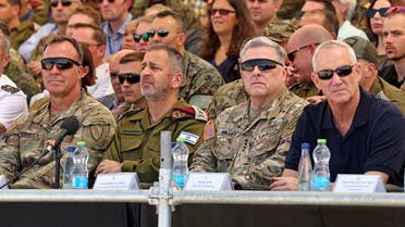 CENTCOM Gen. Erik Kurilla, outgoing Israeli Army Chief of Staff Aviv Kohavi, US Chairman of the Joint Chiefs of Staff Gen. Mark Milley in southern Israel on Sept. 15, 2022. (AFP)